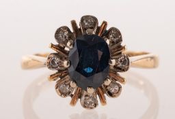 A 1970's 18ct gold sapphire and diamond cluster ring, of oval flowerhead form,