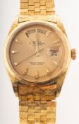 Rolex Oyster Perpetual Florentine gentleman's 18K gold day/date wristwatch the dial having baton