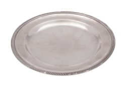 A late Victorian silver side plate, circular form and with a gadroon border, by Elkington & Co Ltd,