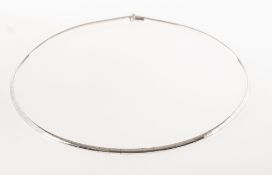 A 9ct white gold collar necklace, push-in clasp, figure of eight safety catch, UK import mark, 375,