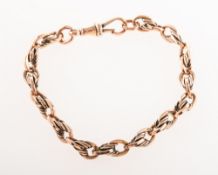 A fancy link bracelet, with swivel clasp, swivel clasp marked 9 .375, majority of links marked 9 .