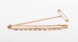 A pearl and diamond bar brooch, set with alternating cultured pearls,