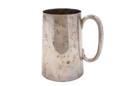 A George V silver mug, of tapering circular form, with a 