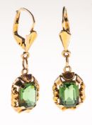 A pair of vintage green paste stone set drop earrings,