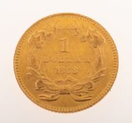 A one dollar coin, 1868, marked United States of America to verso, 1.6grams.