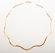 An 18ct gold collar necklace, of scalloped design, push in clasp, figure of eight safety catch,