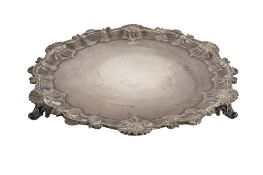 A Victorian silver salver, of shaped circular outline,