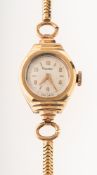Rotary a 9K gold lady's wristwatch the round silvered dial having raised gold Arabic and baton