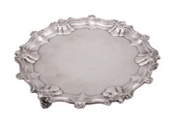 A George V small silver salver, of shaped circular outline,