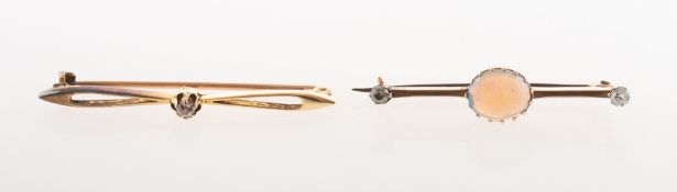 Two antique brooches of varied design, including a Victorian bar brooch,