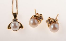 A pearl and diamond pendant with chain and matching earrings,