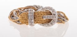 An impressive vintage multi-strand diamond buckle bracelet, circa 1960's / 70's,