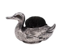 An Edwardian novelty silver pin cushion, in the form of a swimming duck, by Britton, Gould & Co,