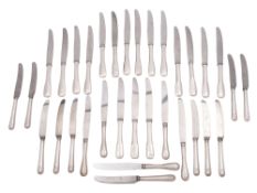 A George VI set of nine silver handled side knives, In Old English & Shell pattern, (steel blades),