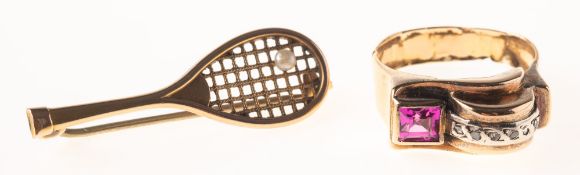 Two items of jewellery, including an Egyptian tank style bi-colour ring,