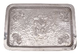 A late Victorian silver dressing tray, of rounded rectangular form,