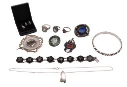 A small quantity of silver jewellery, comprising of a Chinese bracelet, two enamelled brooches,