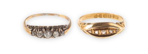 Two early 20th century 18ct gold and diamond five stone rings,