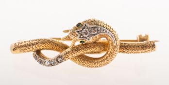 A diamond snake brooch, the entwined snake bar brooch of bi-colour metal, with a textured finish,