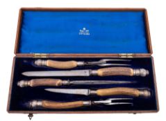 A cased late Victorian silver mounted five-piece carving set, with antler handles, by Mappin & Webb,