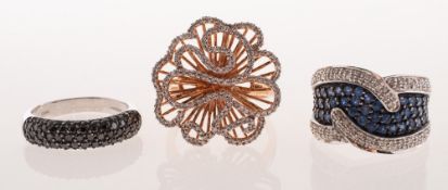Three varied design 9ct gold rings,
