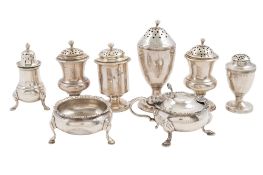 Silver condiments; a squat circular salt, a mustard pot & six pepper casters, mixed makers & dates,