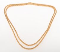 A late 20th century Italian double strand necklace, circa 1970's/80's,