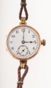 Moeris a gentleman's 1920s 9K gold wristwatch the white enamel dial having black Arabic numerals