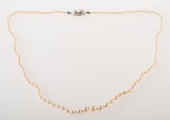 Two cultured pearl necklaces of varied design, both strings graduated and knotted,