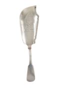 A George III silver fish slice, Fiddle pattern, with a pierced blade and a textured border,