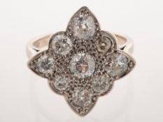 A diamond cocktail ring, the ring of diamond shape with scalloped edges,