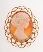 A 1960's 9ct gold cameo brooch pendant, the carved cameo depicting a maiden,
