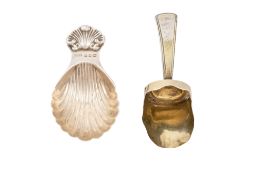 A George III silver-gilt caddy spoon, with a shovel bowl and a Old English reeded handle,