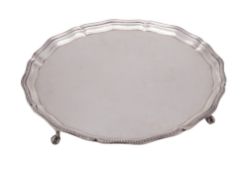 A 20th century silver salver, of shaped circular outline,