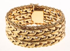 An impressive vintage bracelet, of wide woven textured finish links with rope twist edging,