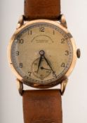 Goldsmiths & Silversmiths Co. Ltd, a gentleman's 1950s gold wristwatch