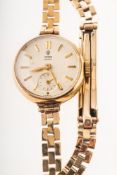 Tudor Royal, a 9K gold lady's wristwatch the round dial having raised baton numerals,