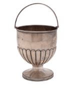 A George III swing-handle silver sugar basket, circular form,