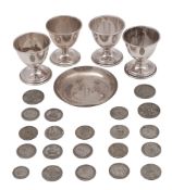 A small mixed lot of various silver, to include a set of four Elizabeth II egg cups,