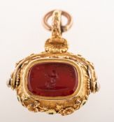 A Victorian carnelian and bloodstone seal fob, an ornately mounted swivel fob seal,