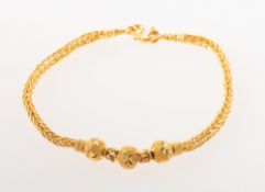 A fancy link bracelet, possibly of Far Eastern origin, an 'S' link clasp to open spiga style chain,