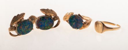An opal doublet ring and matching earrings and a signet ring, the ring of foliate form,