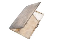 A George VI silver cigarette case, rounded rectangular form, with engine-turned decoration,