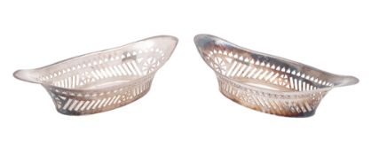 A pair of late Victorian silver bonbon dishes, of shaped navette outline,