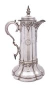 A large silver plated communion flagon, lobed circular form,