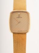 Omega a gentleman's 18K gold wristwatch the cushion-shaped dial with horizontal pin-stripe