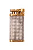 A Dunhill Unique lift arm petrol lighter, with silver plated 'hobnail' body and gilt fittings ,