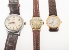 Longines Quartz a gentleman's 9K gold wristwatch and two further watches the round cream dial