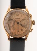 A gentleman's 18K gold chronograph wristwatch the gilt dial having seconds and minute subsidiary