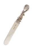 A silver paperknife/ letter opener,